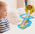 Baby playing with Small Duck Climbing Stairs toy on floor