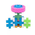 Colourful gear-shaped interlocking blocks built into a flower shape