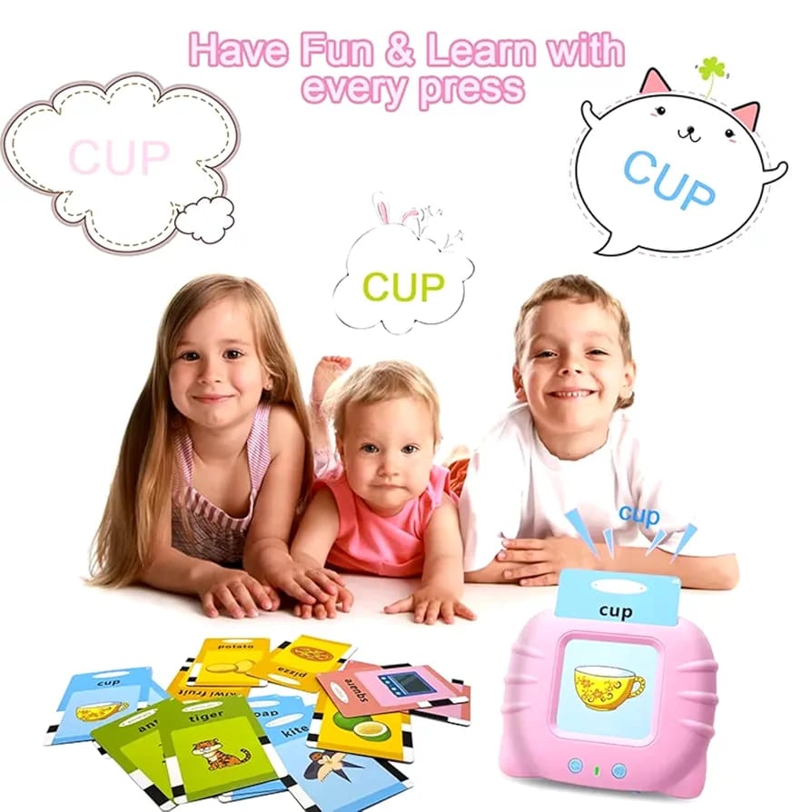 Three children smiling with pink talking flash card reader and multiple learning cards
